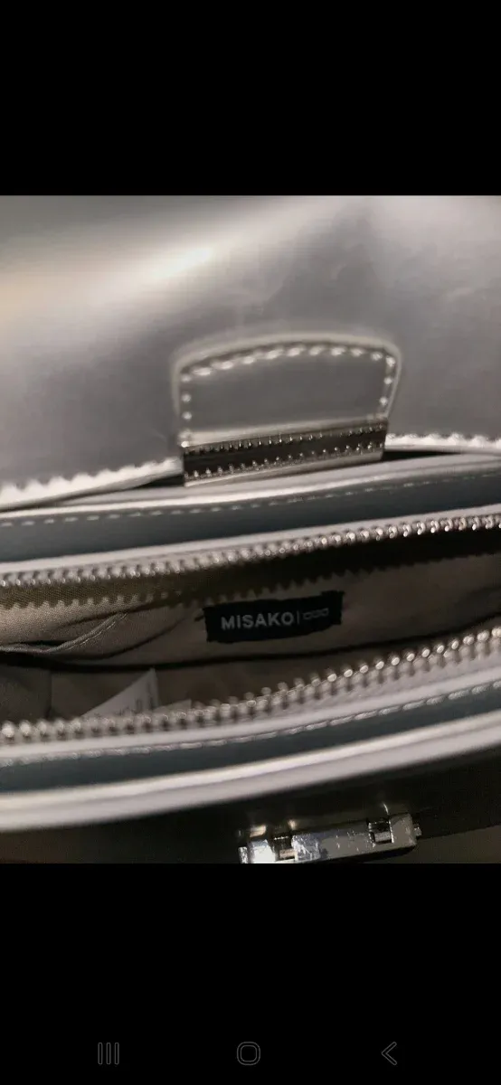 Bolso plateado bandolera