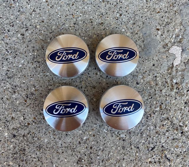 Tapabujes Ford Originales 54mm Plata (4uds)