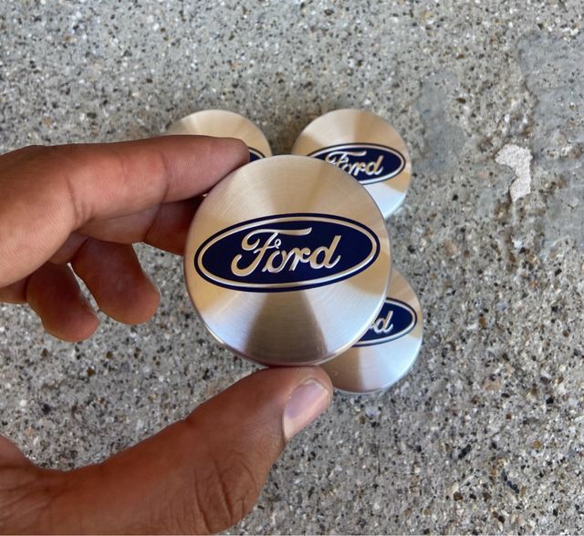 Tapabujes Ford Originales 54mm Plata (4uds)