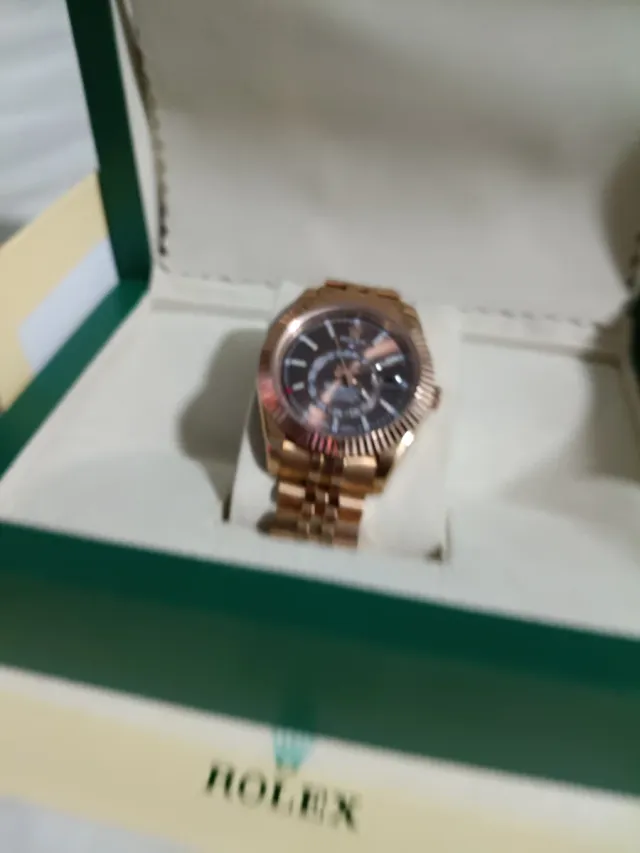 Reloj  Dorado y Marrón