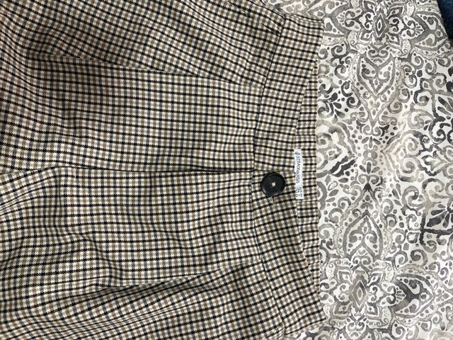 Pantalón vestir pinzas cuadros beige y negro
