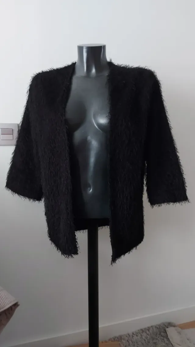Chaqueta de hilos con brillo negra