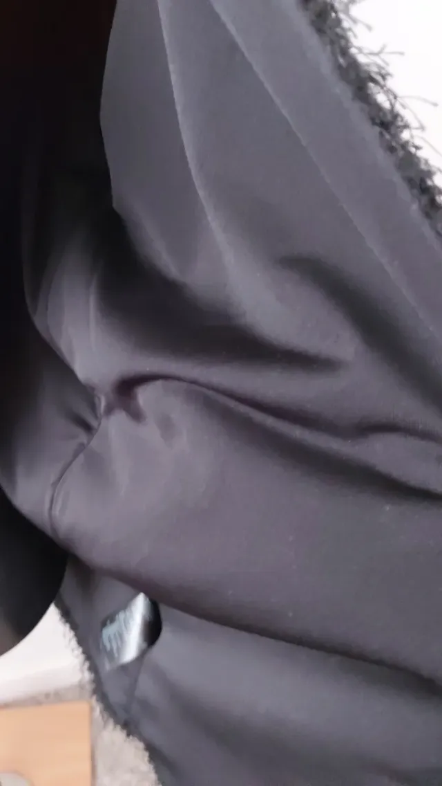 Chaqueta de hilos con brillo negra