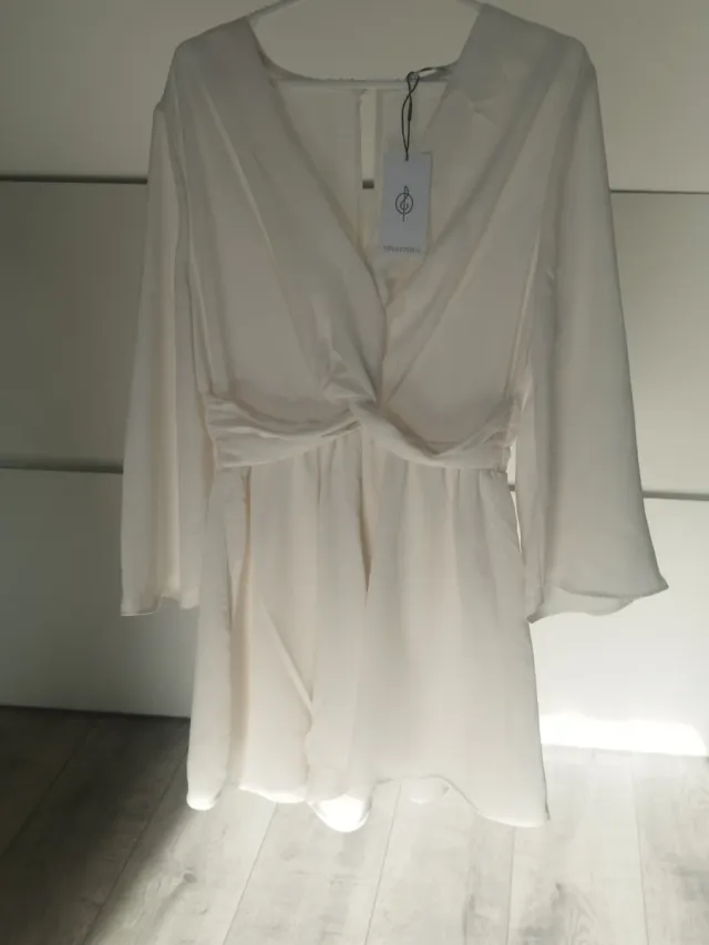 Mono elegante blanco mujer