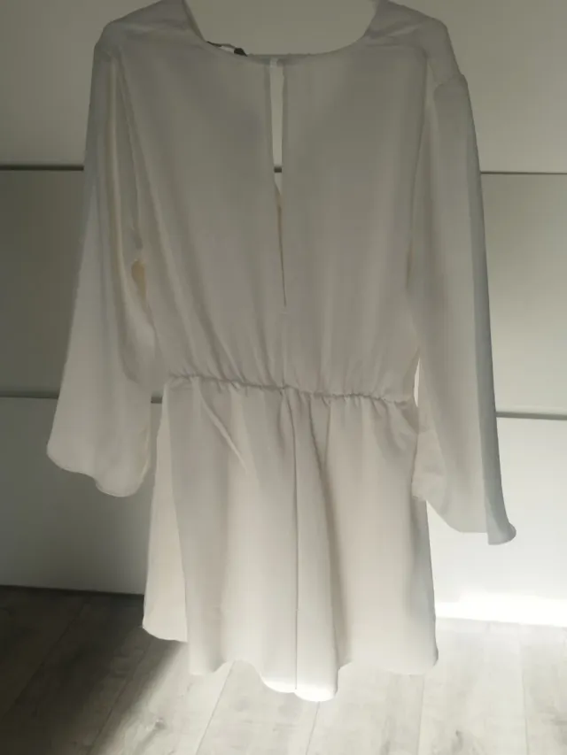 Mono elegante blanco mujer