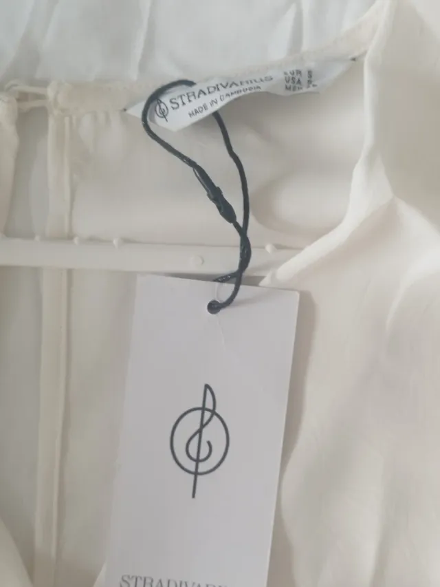 Mono elegante blanco mujer