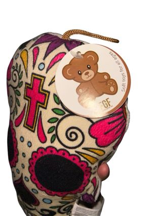 Peluche teschio decorato