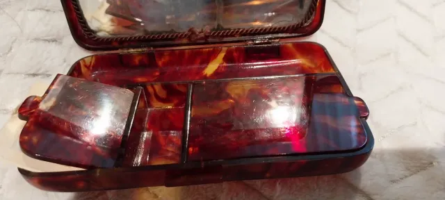 Antigua polvera carey