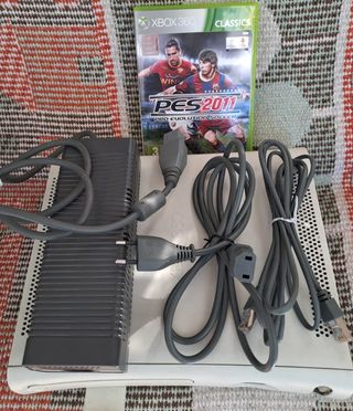 Xbox 360 slim + 4 Giochi