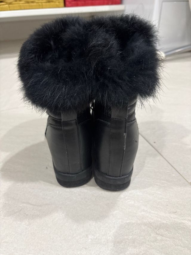 Botas negras con cuña y pelo