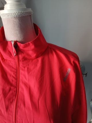 Cortavientos fino Reebok rosa/rojo