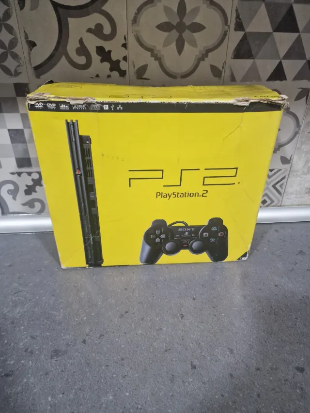 Pack PS2 con caja + 12 Juegos