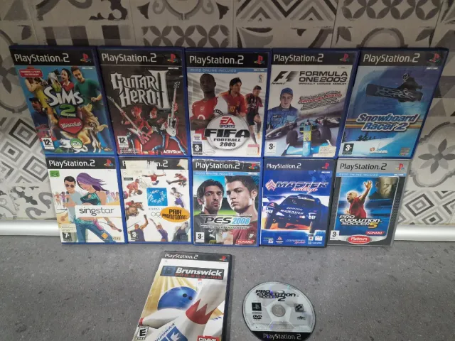 Pack PS2 con caja + 12 Juegos