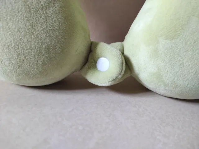 Cojín cervical de viaje verde