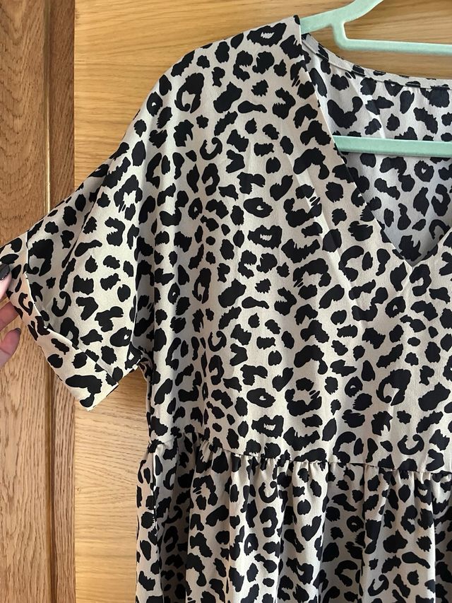 Blusa peplum estampado animal print