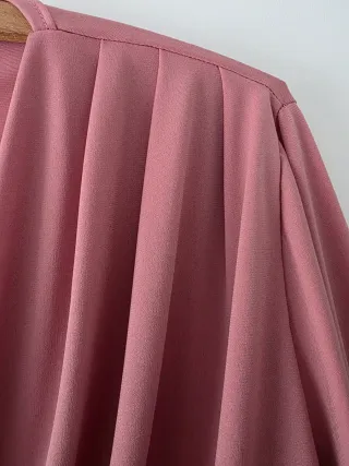 Top rosa escote cruzado manga larga