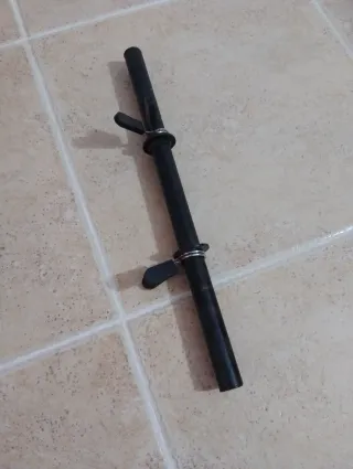 Barra de mancuerna negra