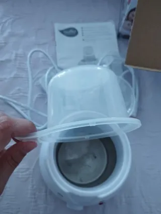 Calienta biberones Nuvita Casa y Coche