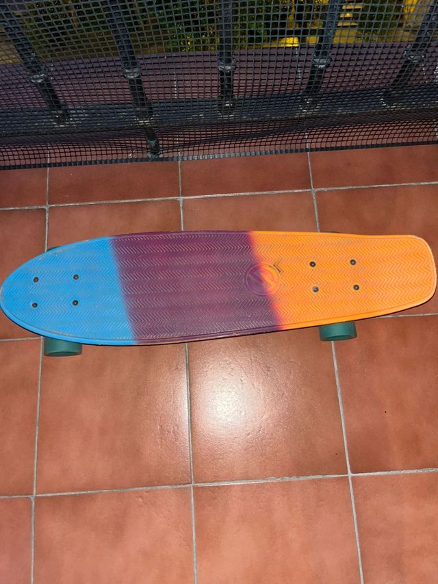 Monopatín Yamba degradado.