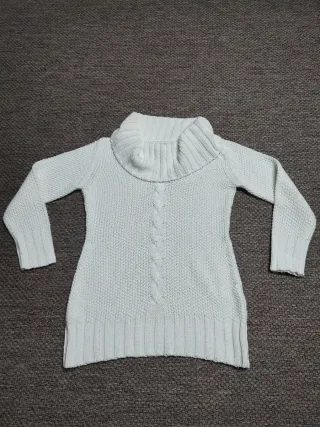 Jersey de punto cuello alto color crema