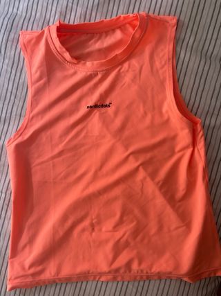 conjunto padel naranja Nordicdots