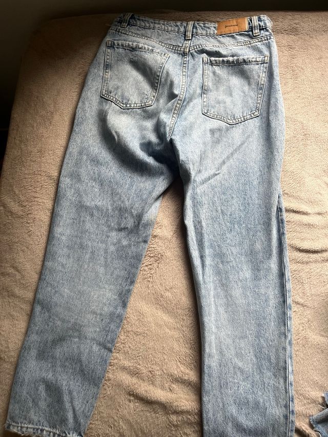 Vaqueros azules de tiro alto