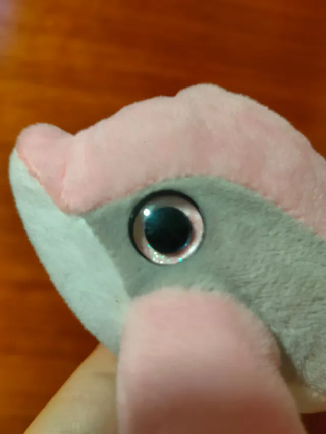 Peluche de delfín rosa y gris