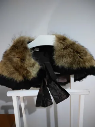 Stola in pelliccia Elcom con nastro
