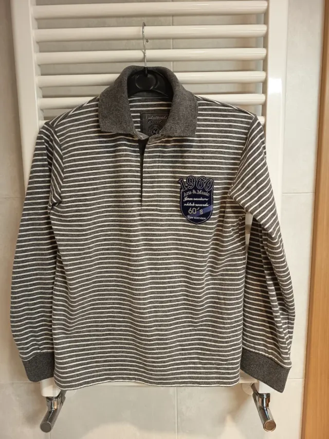 Chaqueta impermeable,polo y camiseta T:9-10