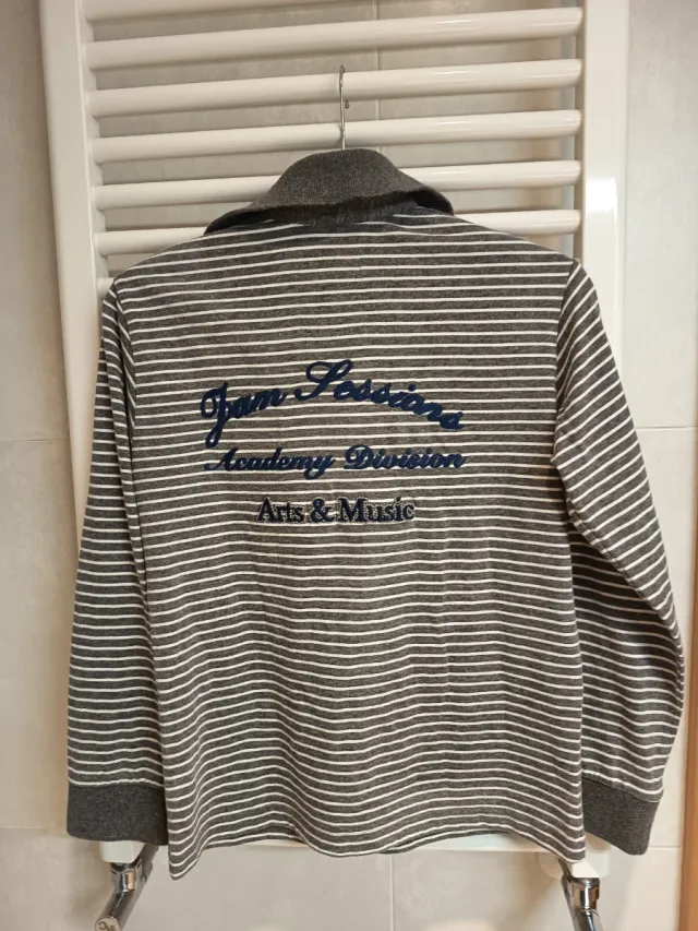 Chaqueta impermeable,polo y camiseta T:9-10