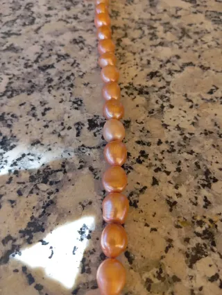 Hilo de perlas naturales naranja y rosa