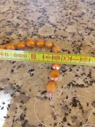 Hilo de perlas naturales naranja y rosa