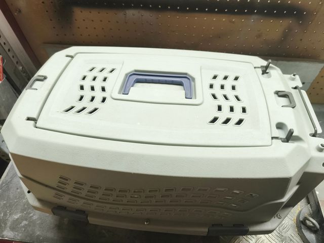 Transportín para mascotas gris y azul .