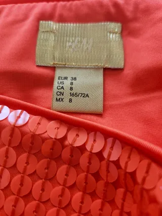 Falda naranja lentejuelas