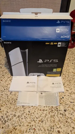 Caja PS5 Digital Edition + manuales