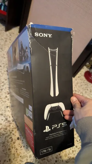 Caja PS5 Digital Edition + manuales