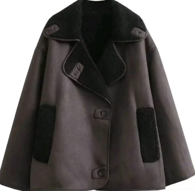 Abrigo marrón y negro 40/420