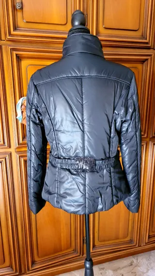 Piumino nero con paillettes veste piccolo