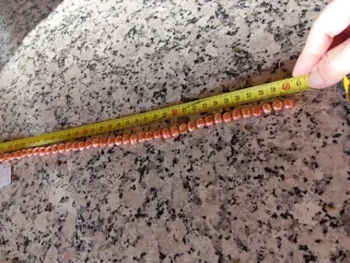 Hilo de perlas naturales naranja y rosa