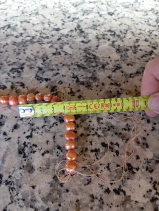 Hilo de perlas naturales naranja y rosa