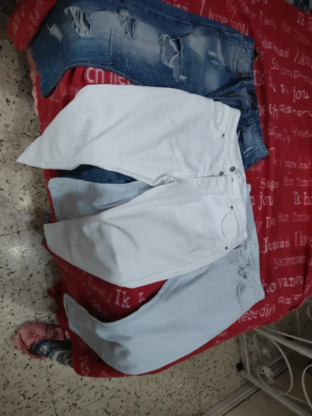 Jeans uomo blu e bianchi