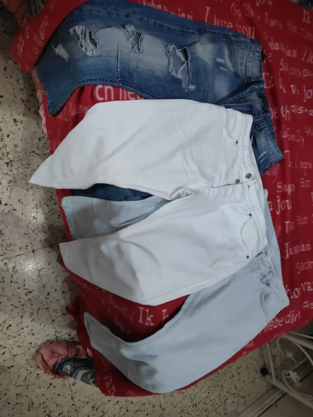 Jeans uomo blu e bianchi