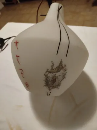 Lampadario in vetro e metallo