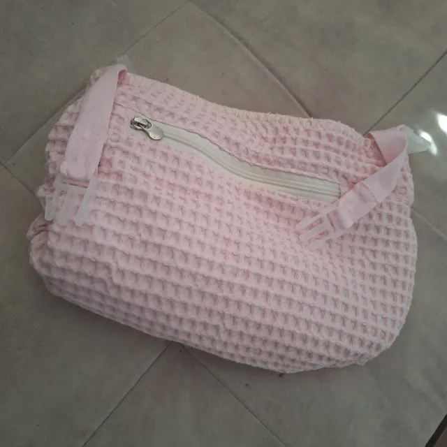 Bolso bebé rosa tejido