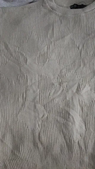 Jersey de punto beige con diseño