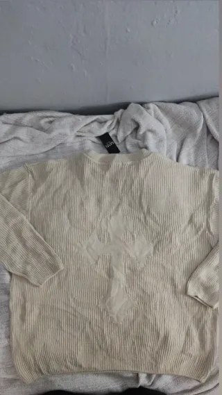 Jersey de punto beige con diseño