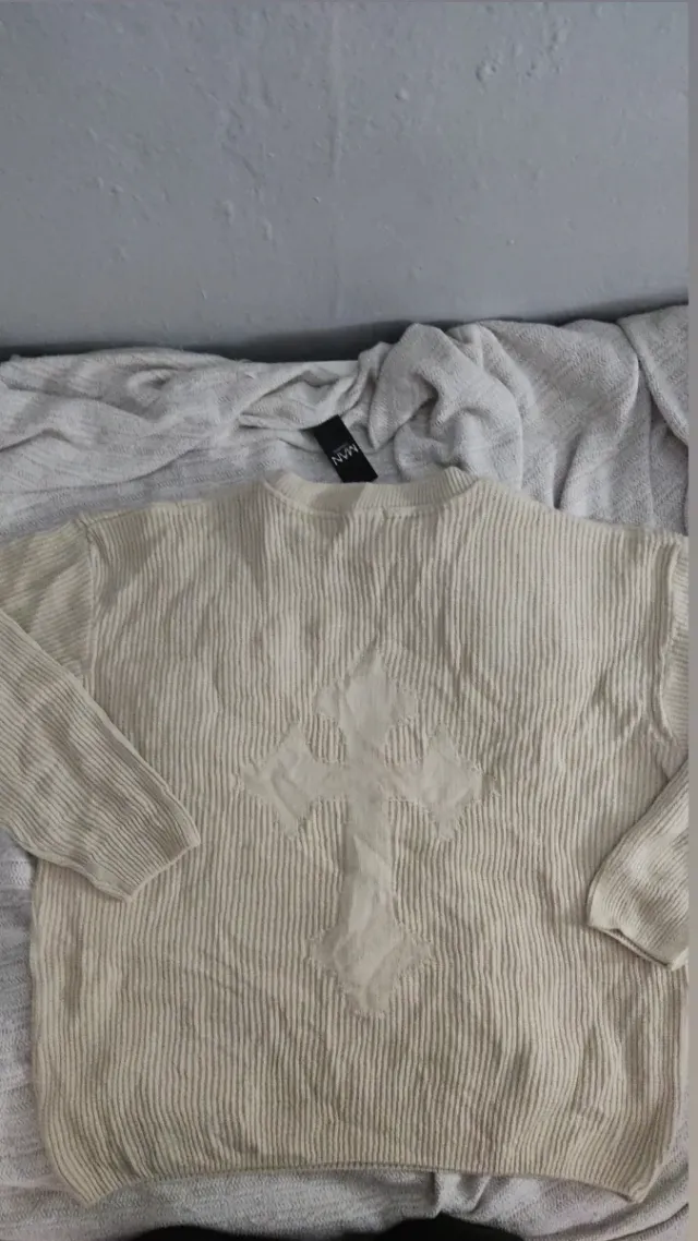 Jersey de punto beige con diseño