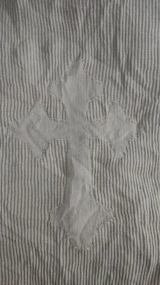 Jersey de punto beige con diseño