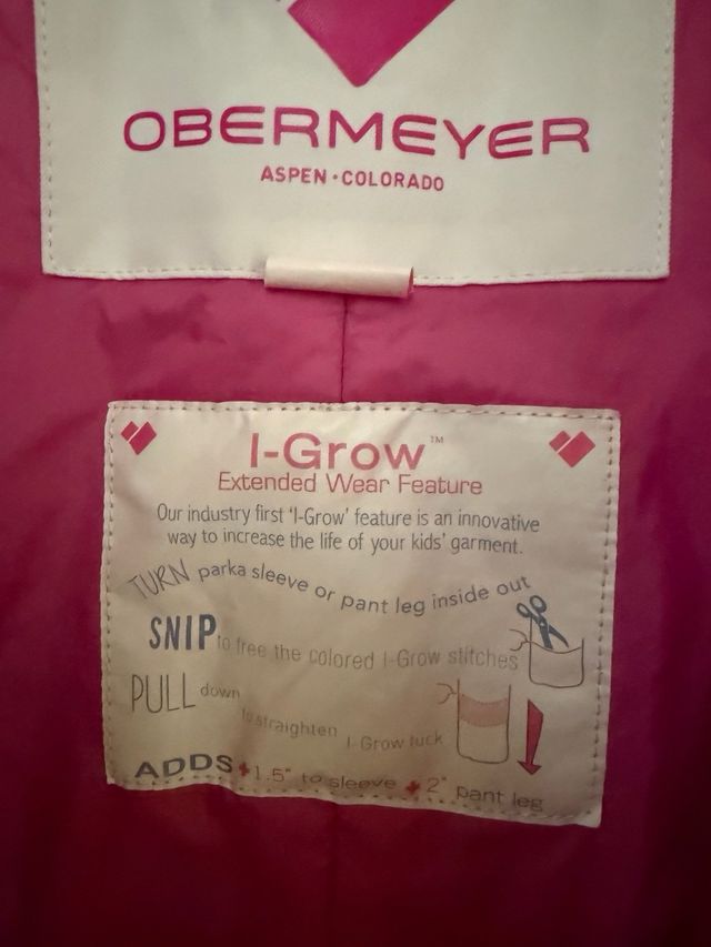 Mono de nieve infantil rosa