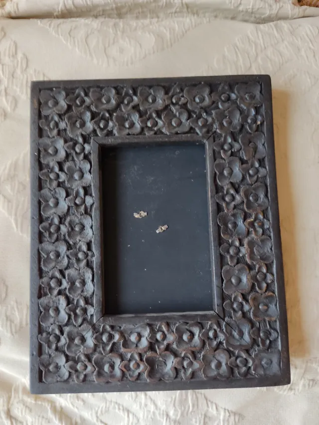 Marco de fotos decorado con flores